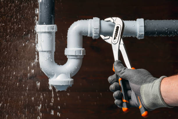 Professional Drain Cleaning technician working in Hollis, NY
